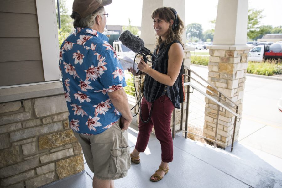 Wisconsin Center for Investigative Journalism public engagement and marketing assistant Natalie Yahr interviews Bob Blersch on primary day at the Oconomowoc Community Center on August 14, 2018, as part of the Center's ongoing series "Undemocratic: Secrecy and Power vs. the People." (Katie Scheidt / Wisconsin Center for Investigative Journalism)