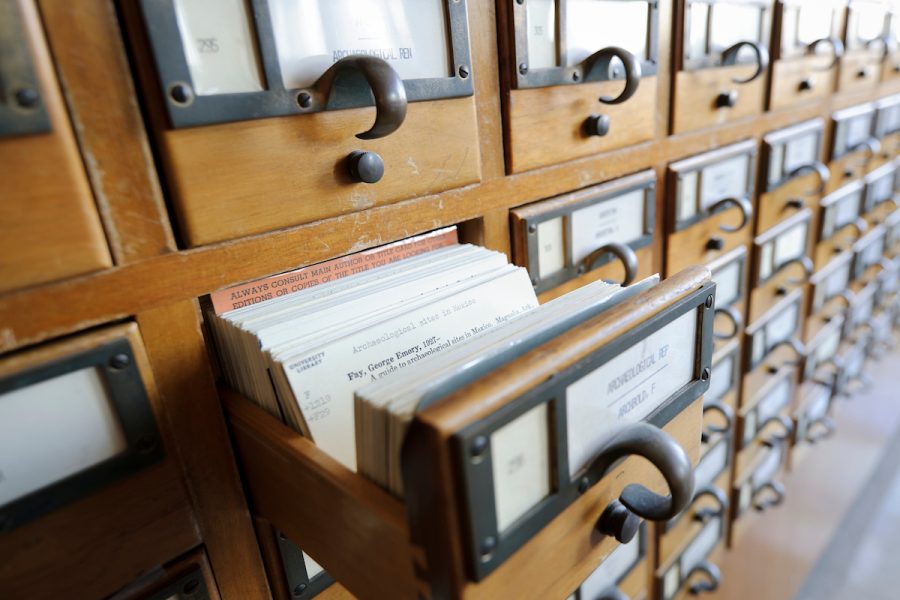 Soon to be legacy, rows of card catalogue drawers are pictured in the Memorial Library at the University of Wisconsin-Madison on March 29, 2012. in May 2012, the library will remove the last of its card catalogues, completing a quarter-century transition to an online record system for books, journals and more. One row of built-in cases will remain as part of a historic display. More than 100 cases are being sold through UW Surplus With A Purpose (SWAP), and 6,700 drawers of cards are being recycled. (Photo by Jeff Miller/UW-Madison)