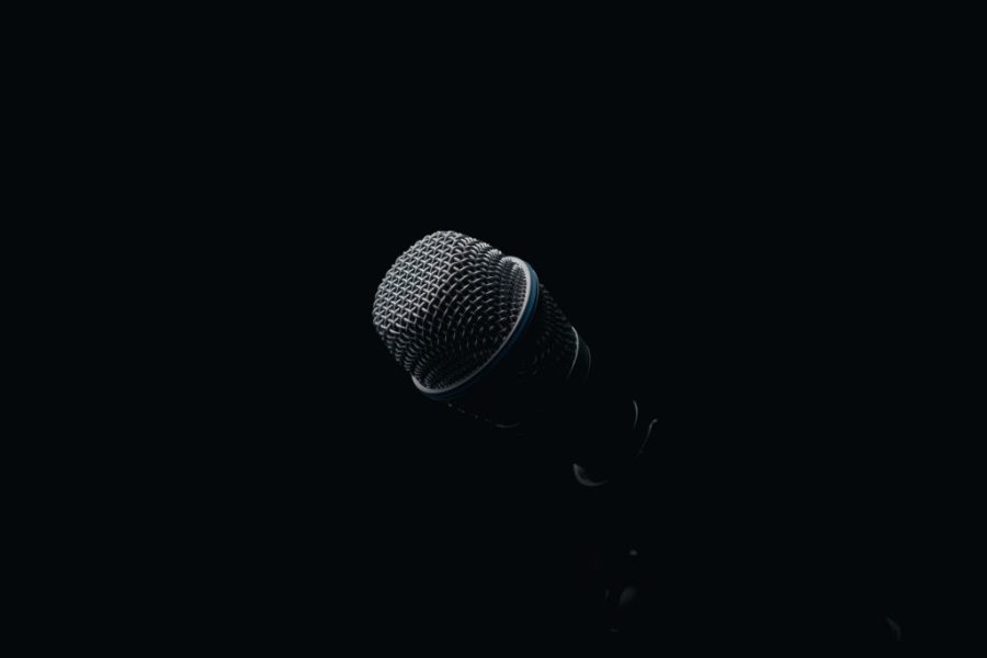 Microphone on a stand in a dark room