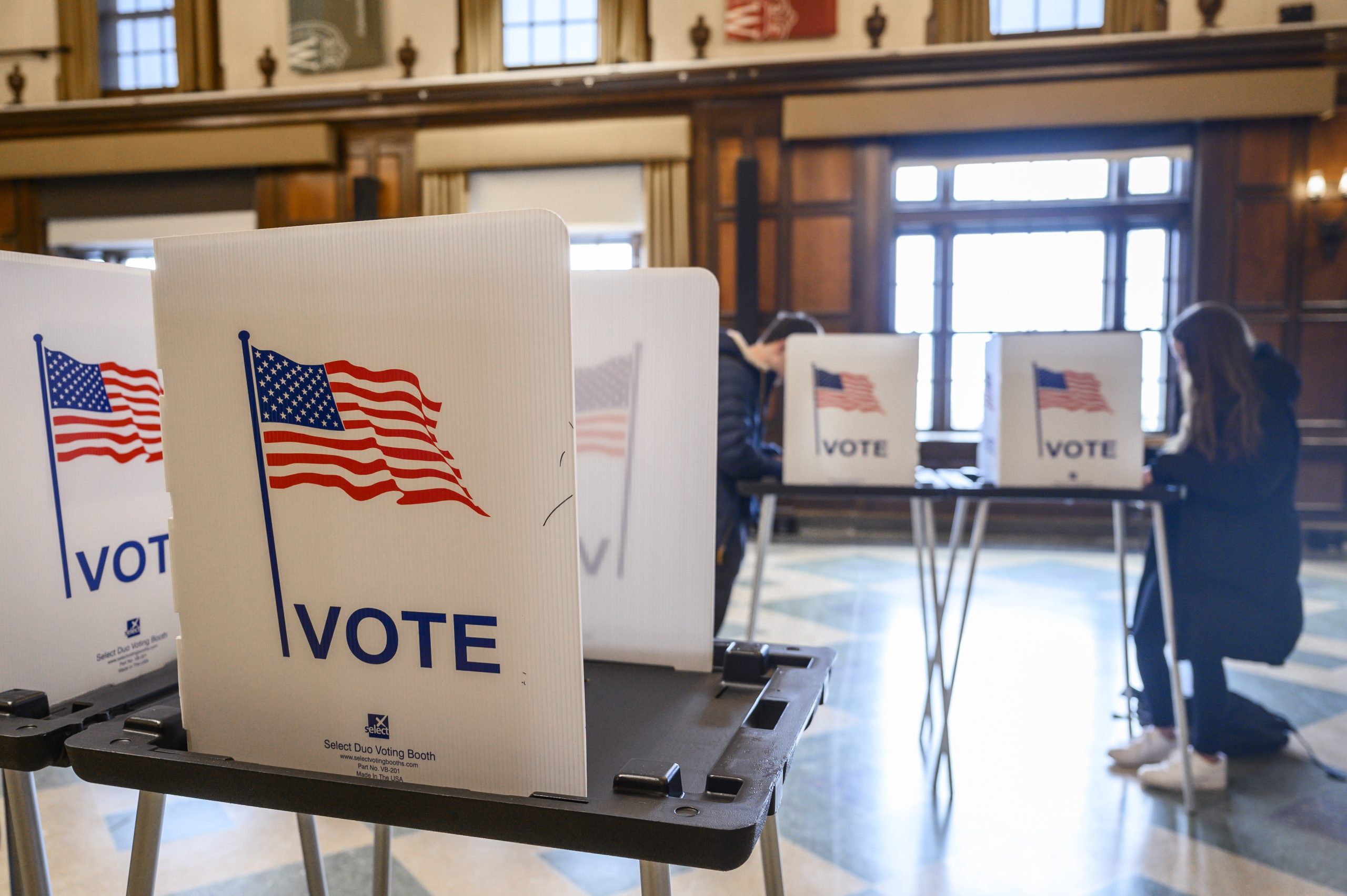 Photo of voting booths set up on the UW-Madison campus.