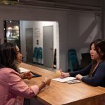 Katrina Pham reporting for Borderless Magazine. Photo courtesy of Max Herman/Borderless Magazine.